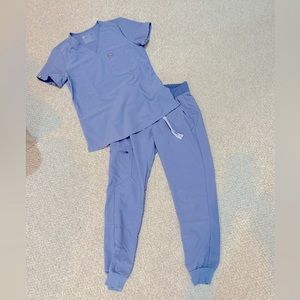 Figs scrubs set: Catarina top and Zamora jogger pants; space blue